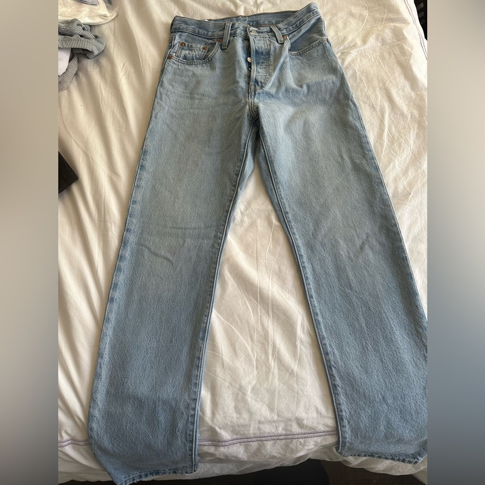 Levi’s 501 25 Waist 32 length 
Button Fly jeans